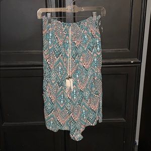 Pink and blue geometric romper